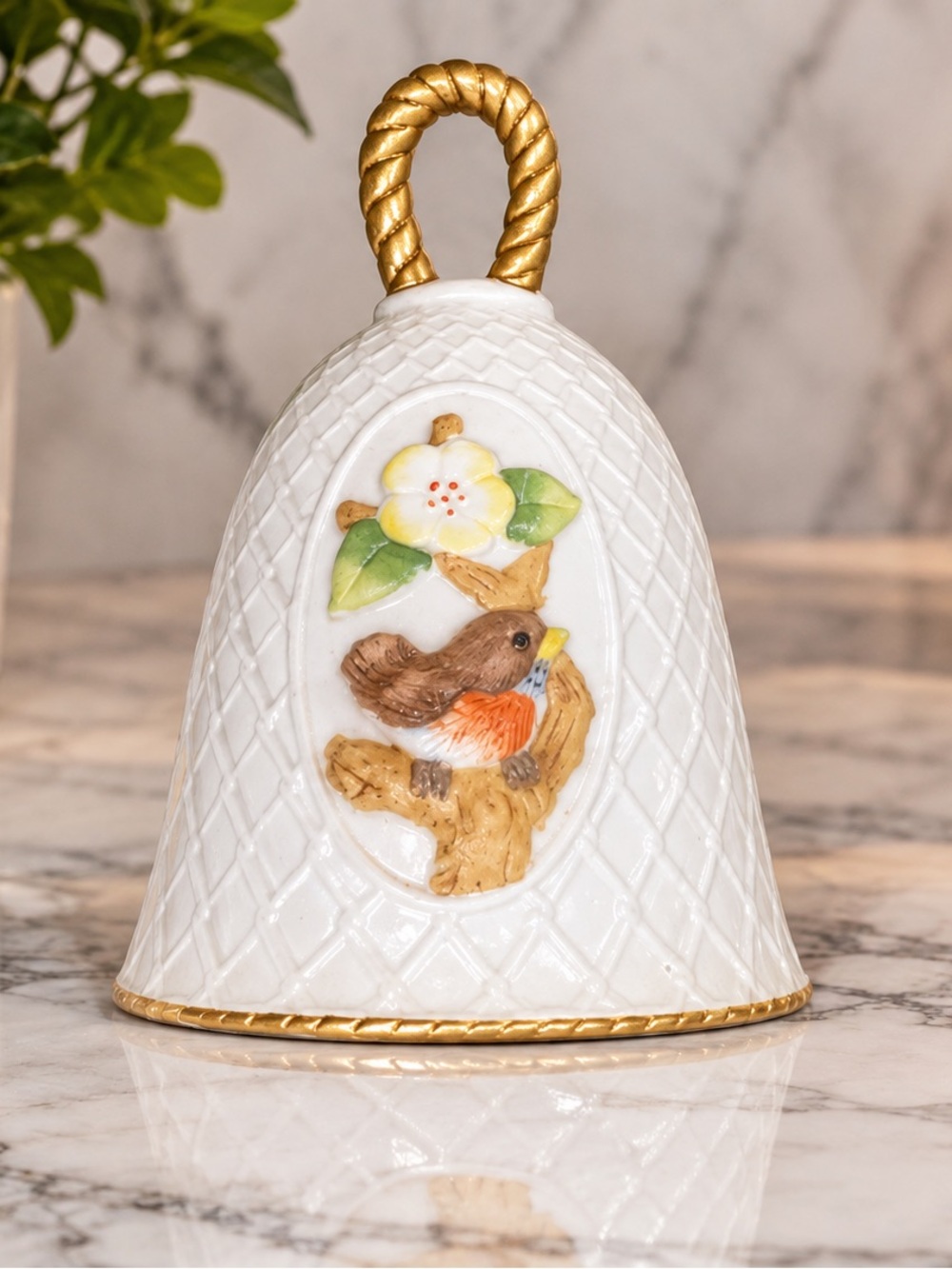 White Porcelain Bell with Bird Motif and Gold Handle